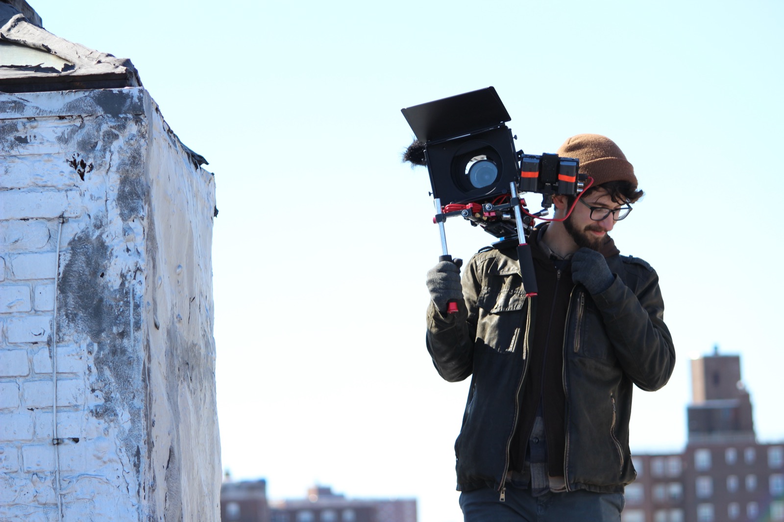 Behind the scenes filming on a rooftop