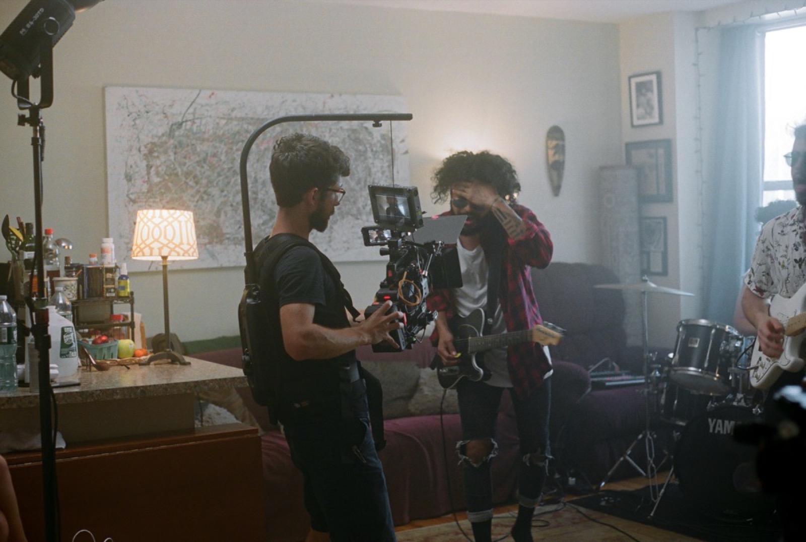 Behind the scenes filming a living room scene